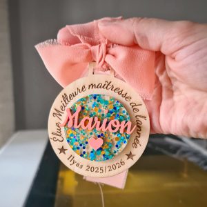 Médaille pailletée